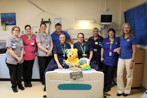 Rob (centre) and Debbie (far right) from BHC&F with Bedford Hospital Riverbank Ward staff.