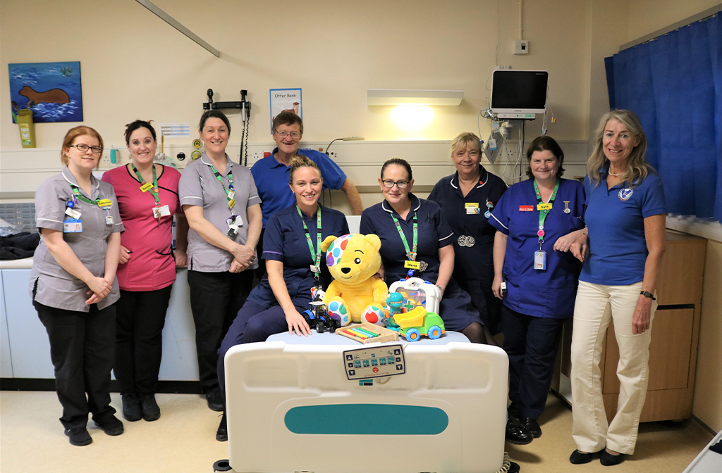 Rob (centre) and Debbie (far right) from BHC&F with Bedford Hospital Riverbank Ward staff.